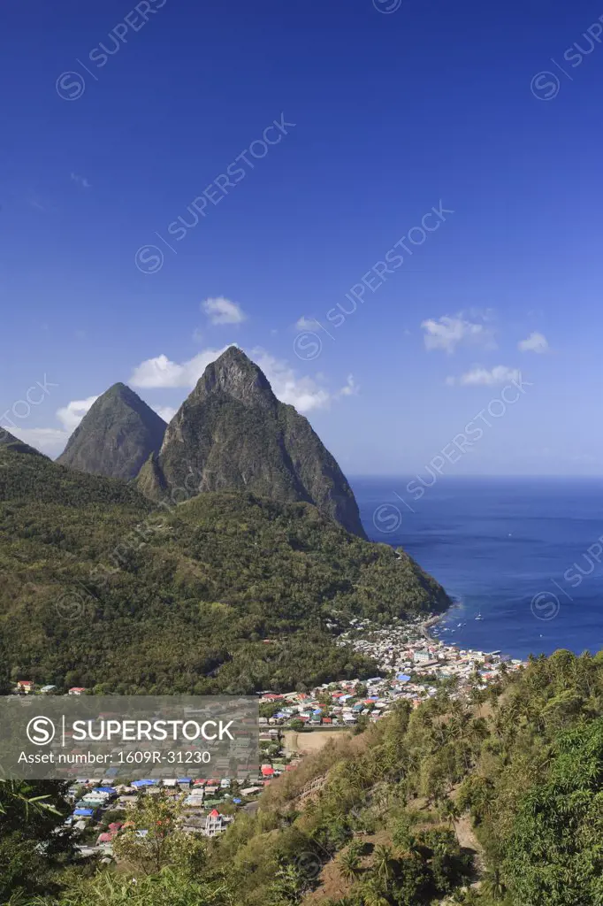 Caribbean, St Lucia, Petit and Gros Piton Mountains (UNESCO World Heritage Site) and town of Soufriere