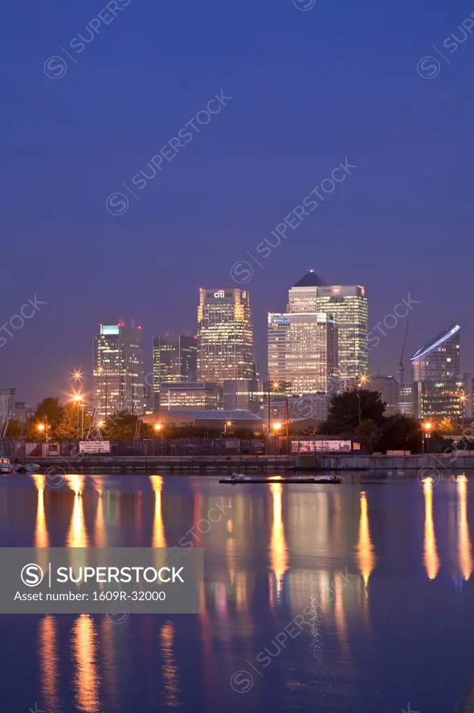 England, London, Newham,  Royal Victoria Docks, Canary Wharf buildings at dawn