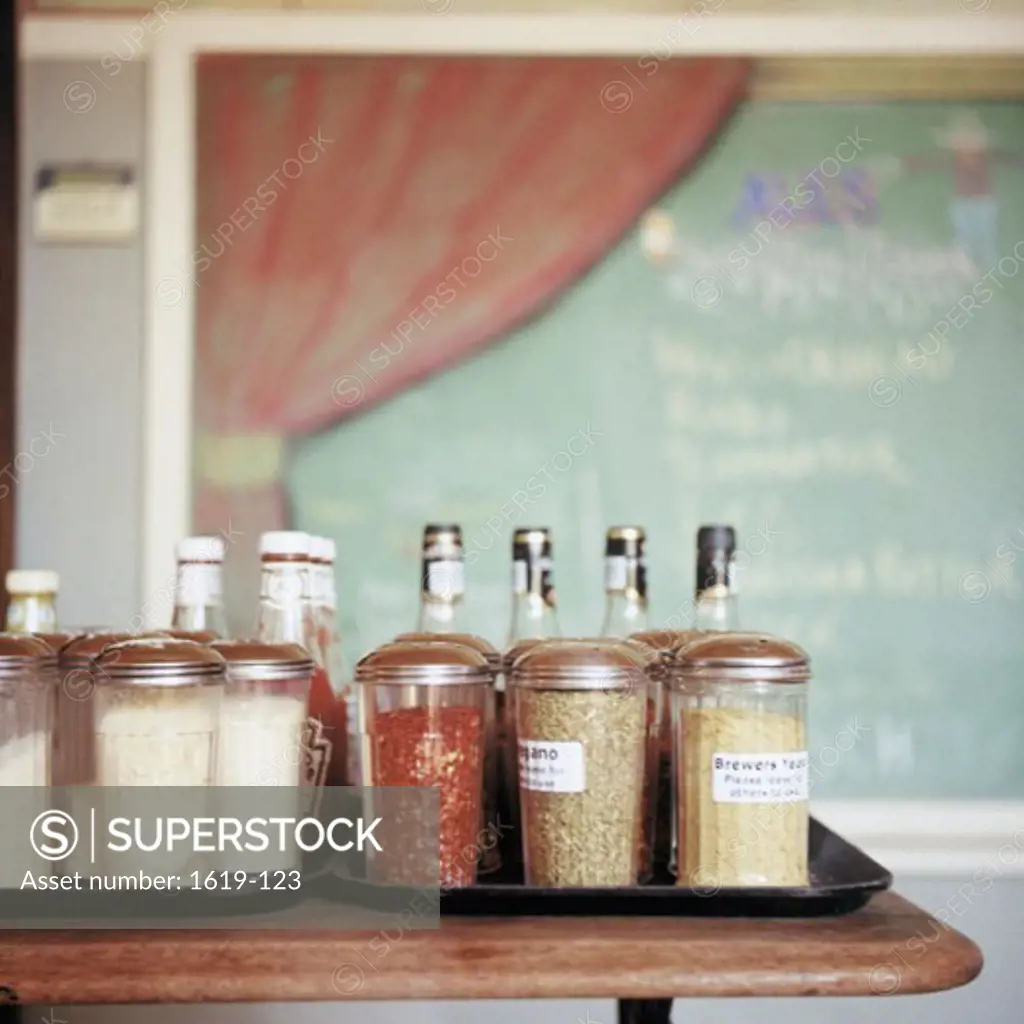 Spices in jars in a restaurant
