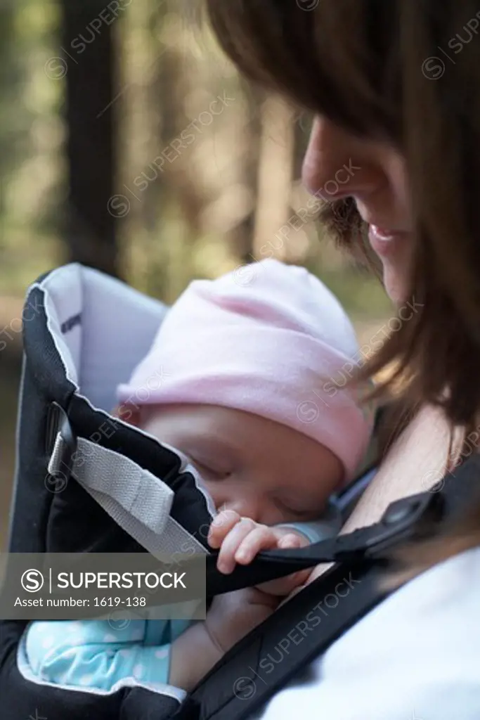 Close-up of a woman with her baby