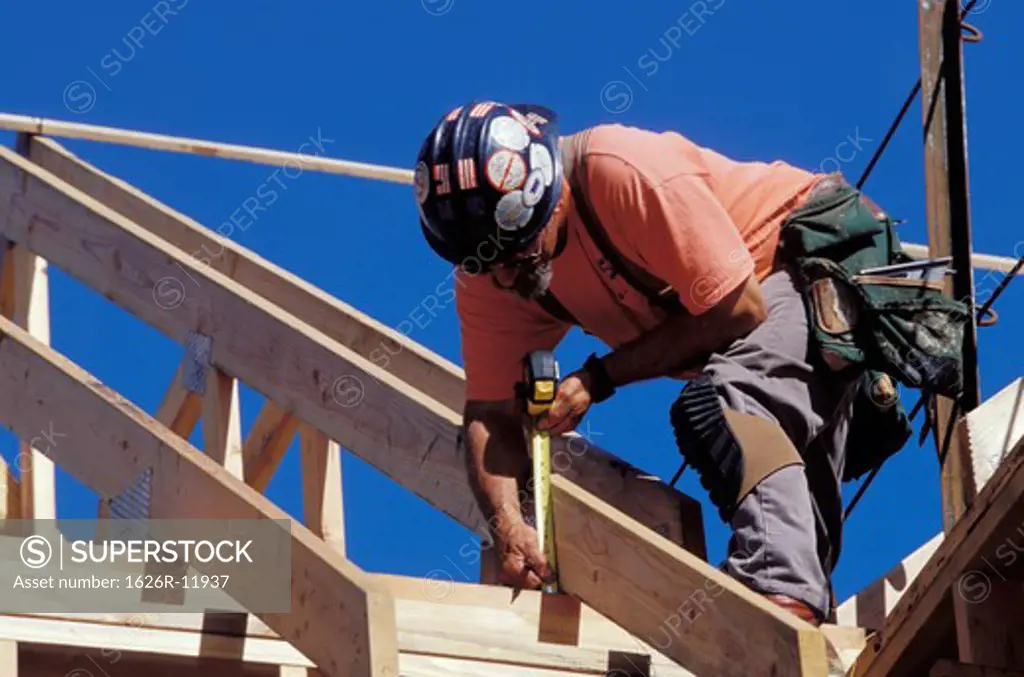 Carpenter Working on Roof