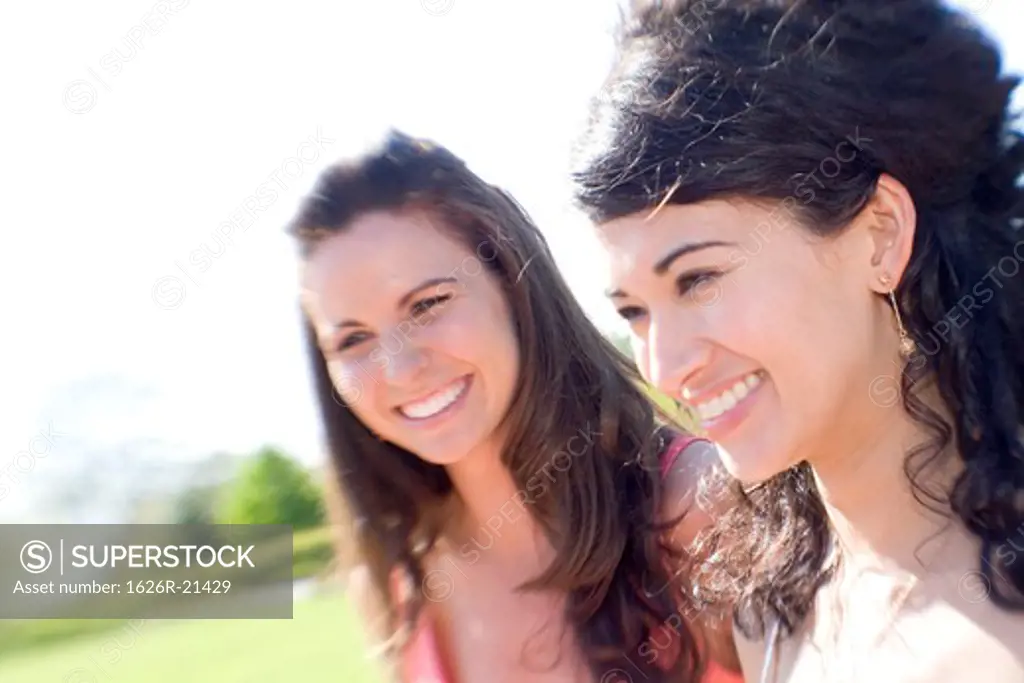 Women Smiling in Sunlight
