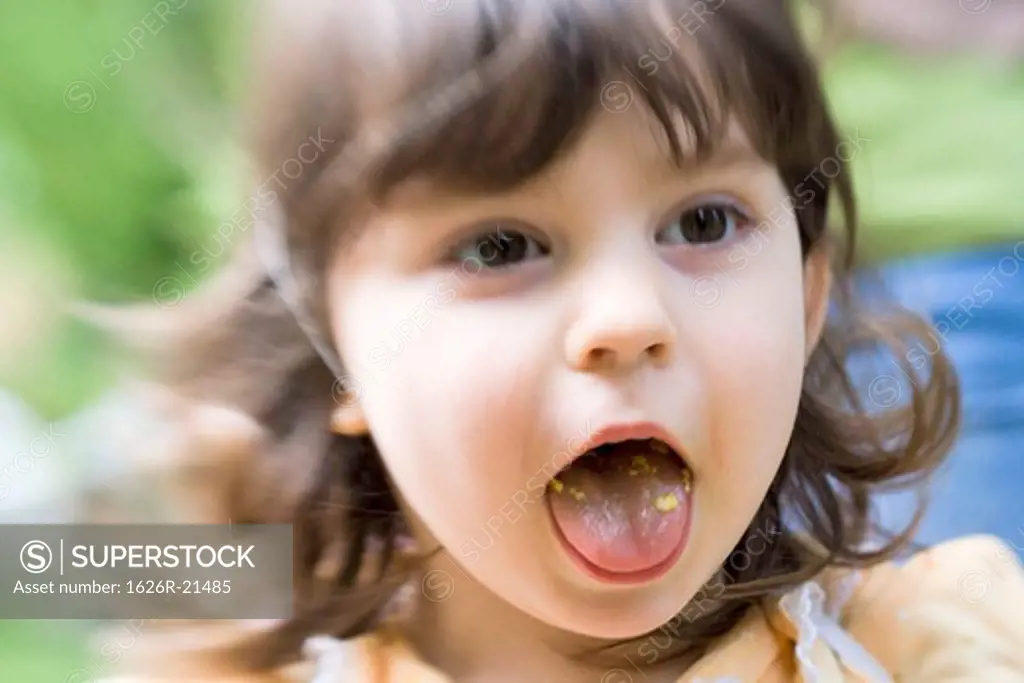 Girl Showing Food in Mouth