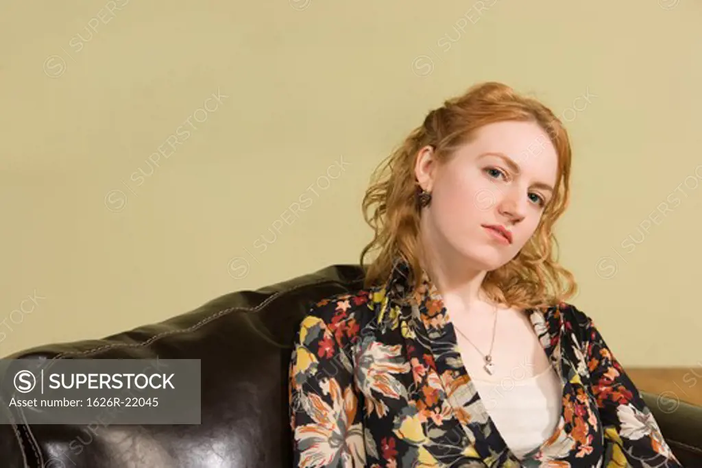 Woman Sitting on Couch