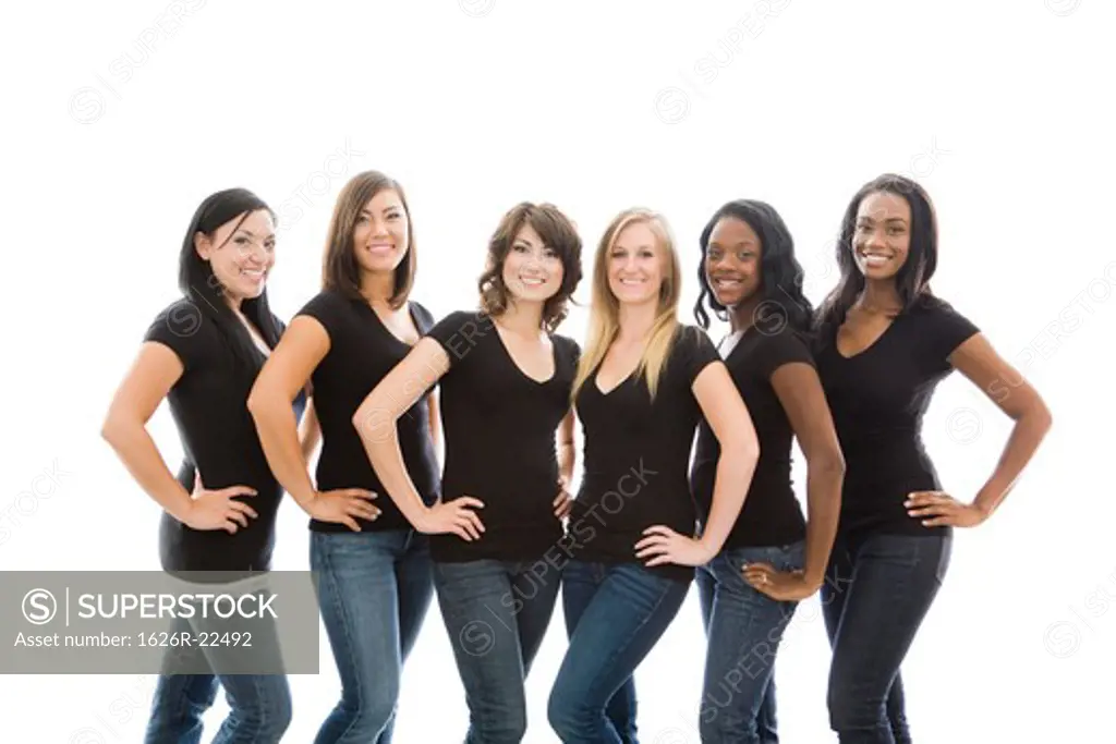 Six Attractive Young Women in Matching T-shirts and Jeans
