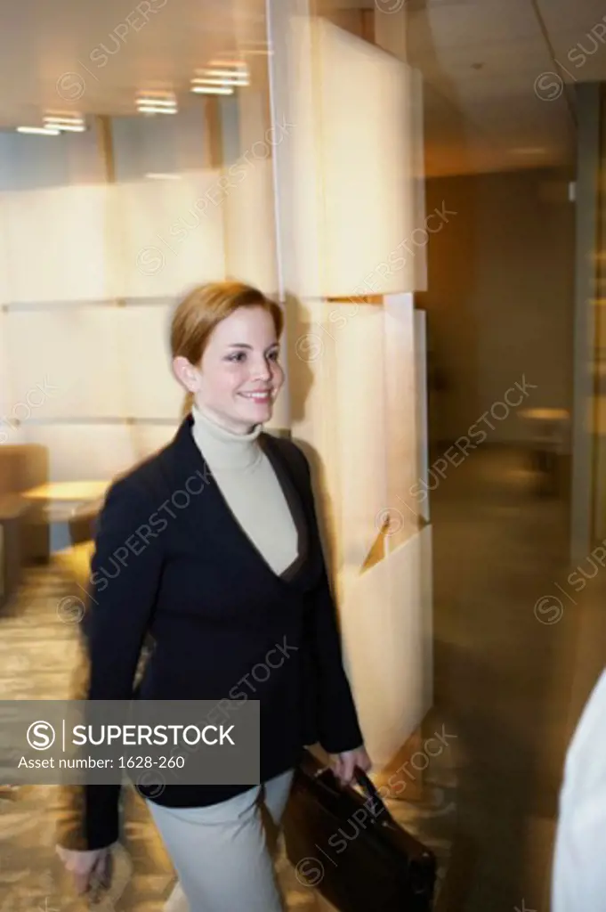 Businesswoman carrying a bag