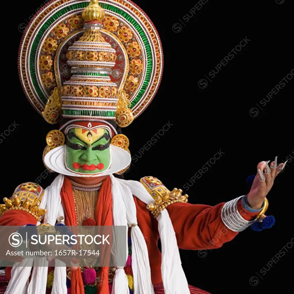 Portrait of a Kathakali dance performer dancing