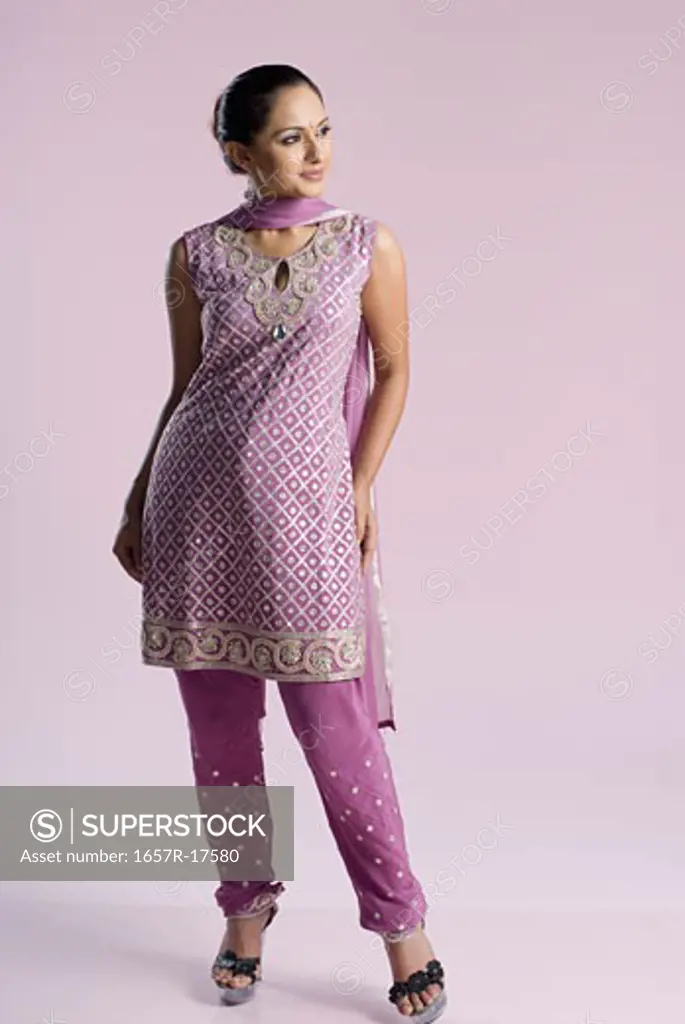 Mid adult woman standing in salwar kameez