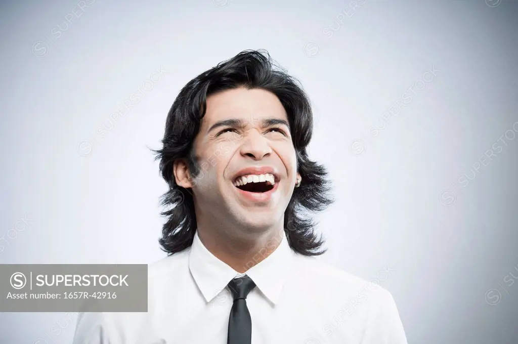 Close-up of a businessman laughing