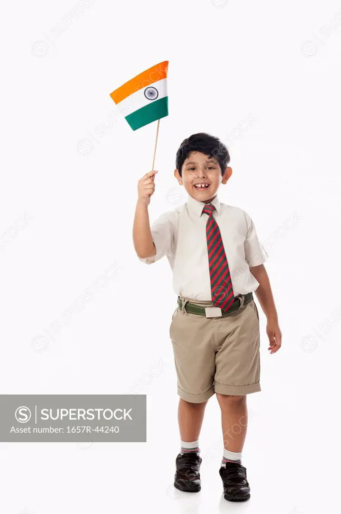 Schoolboy holding an Indian flag