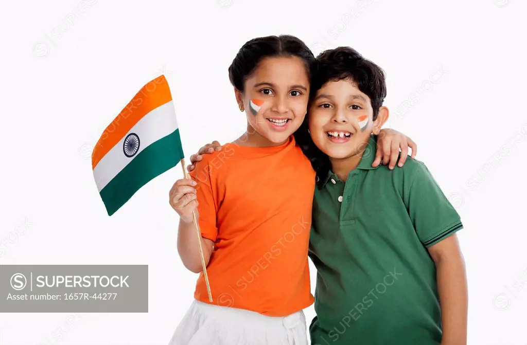 Children holding an Indian flag