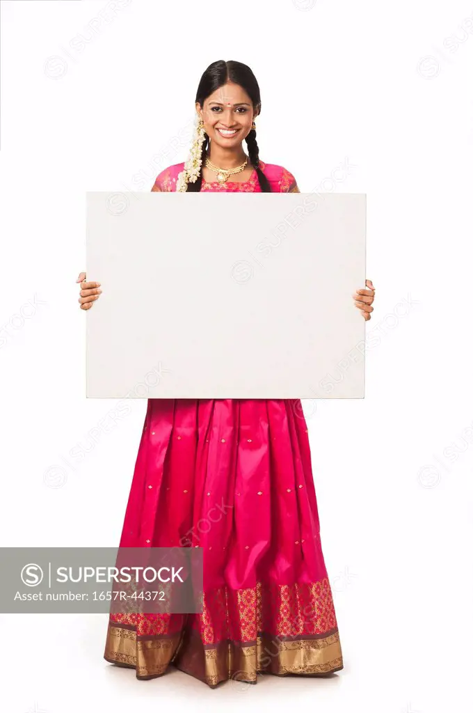 South Indian woman showing a blank placard