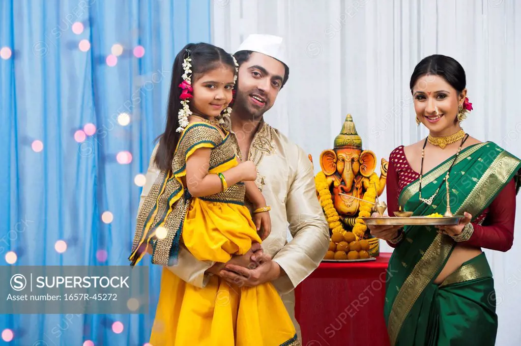 Maharashtrian family celebrating Ganesh Chaturthi festival