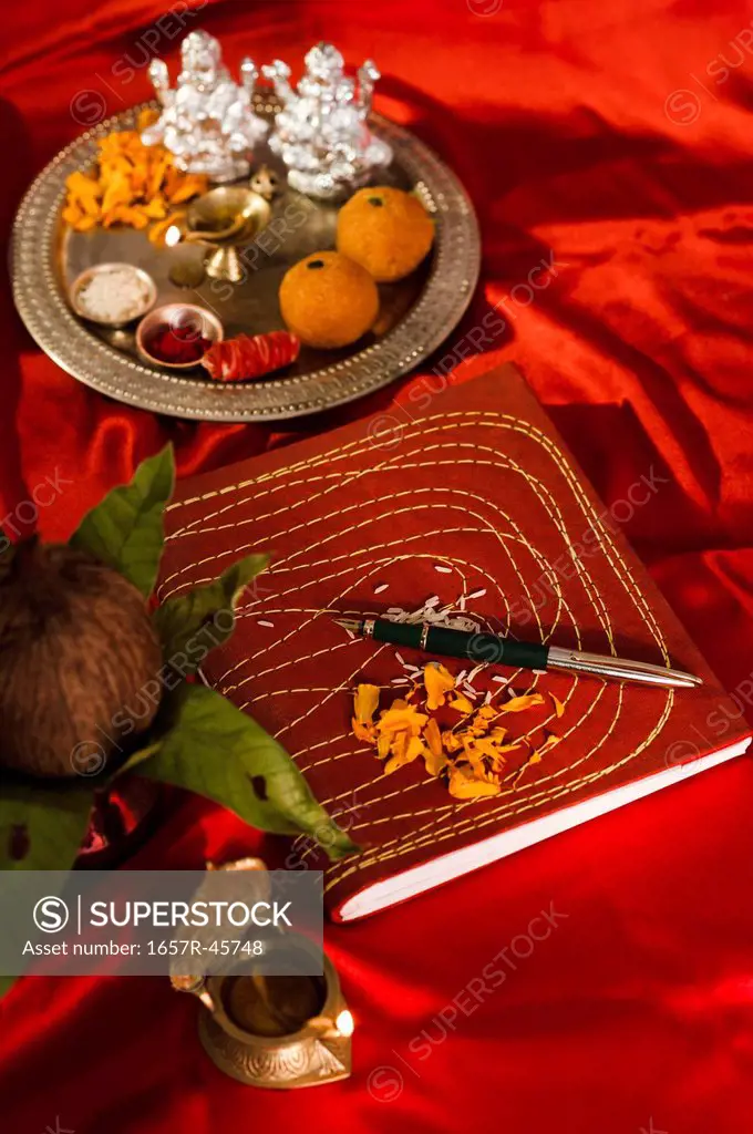 Lakshmi pujan with ledger book during Diwali festival