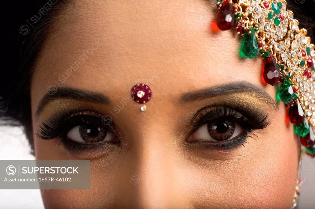 Close-up of a face of Indian bridal in traditional wedding dress