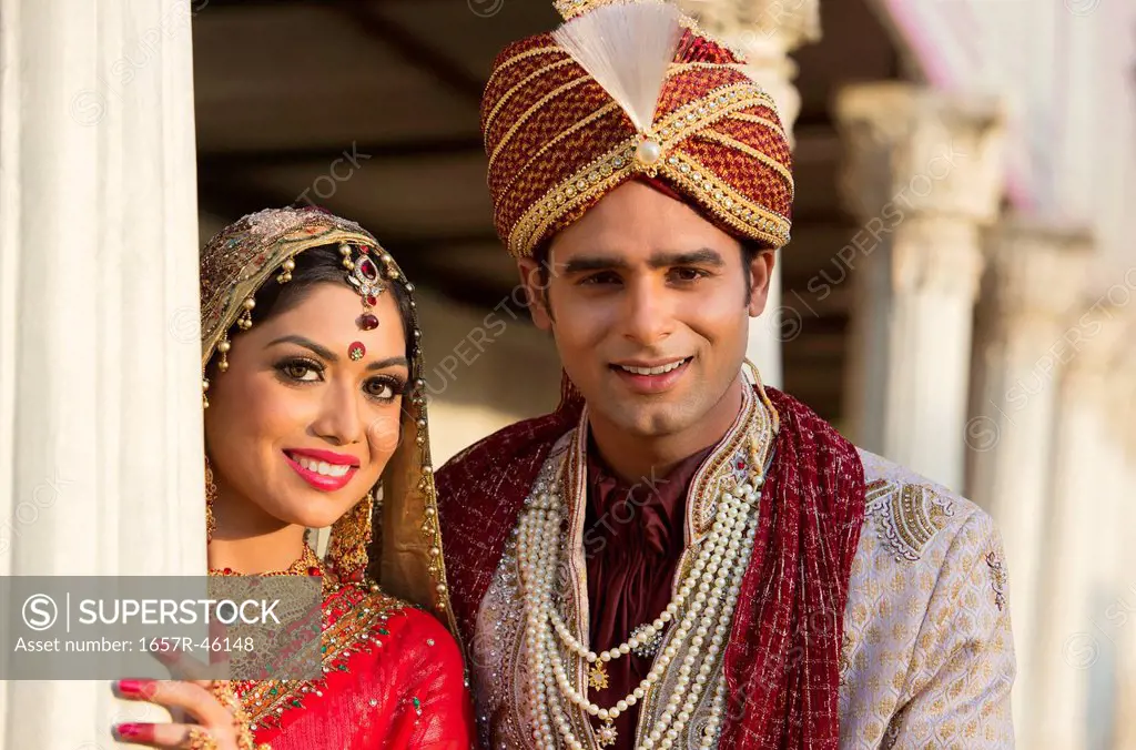 Indian bride and groom in traditional wedding dress