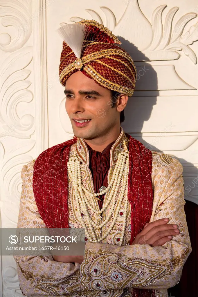 Indian groom in traditional wedding outfit