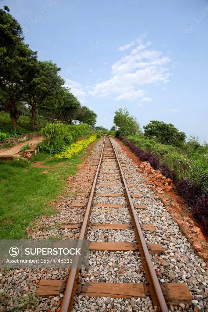 Railroad track passing through a landscape, Visakhapatnam, Andhra Pradesh, India