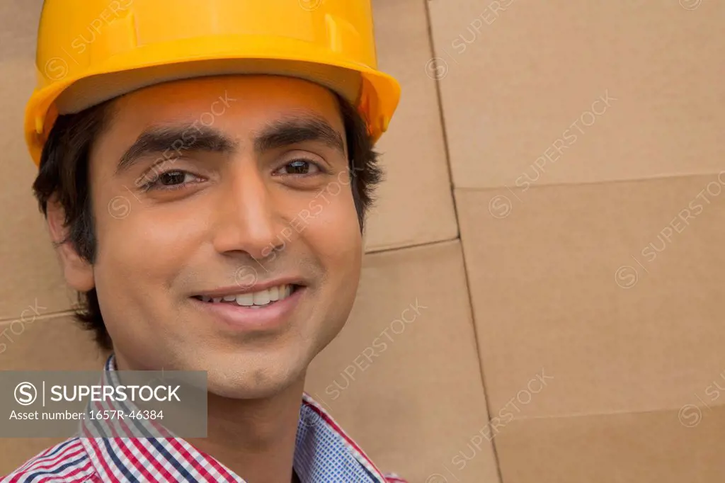Portrait of a warehouse worker smiling
