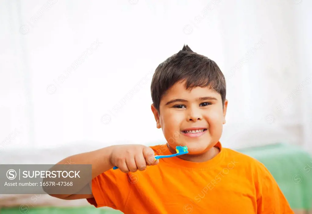 Close-up of a boy brushing his teeth