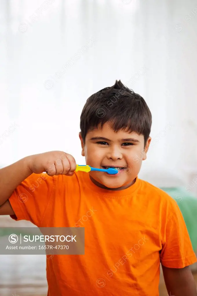 Close-up of a boy brushing his teeth