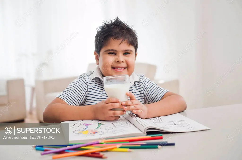 Portrait of a boy drinking milk