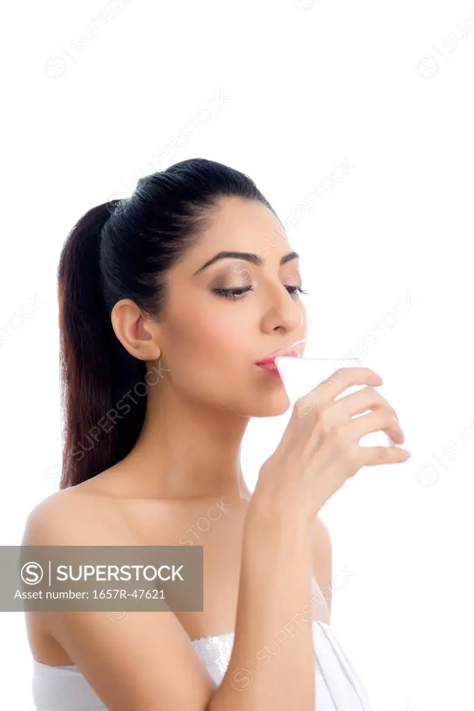 Close-up of a woman drinking water