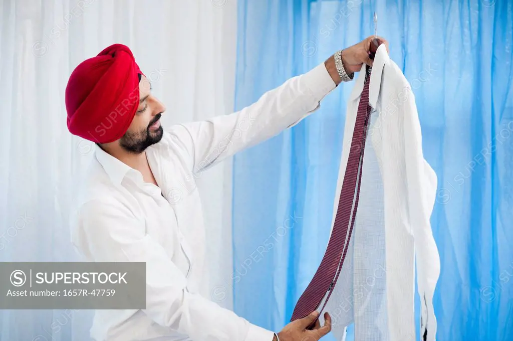 Sikh man matching a tie