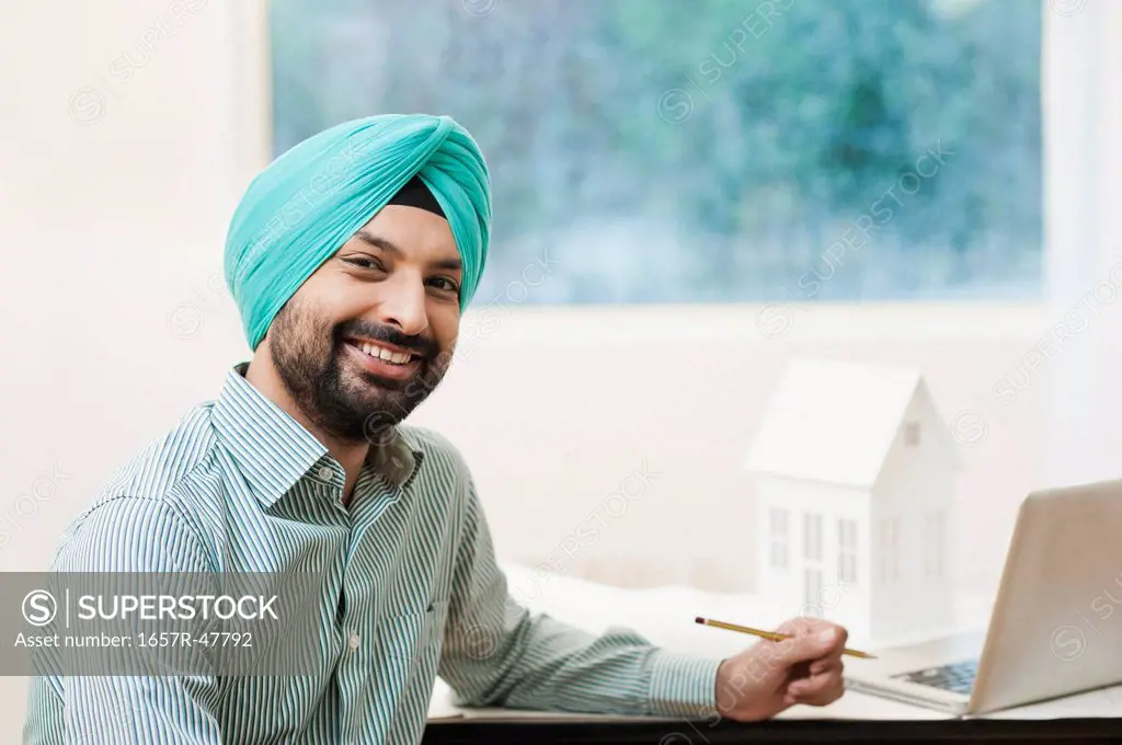 Portrait of a male architect smiling