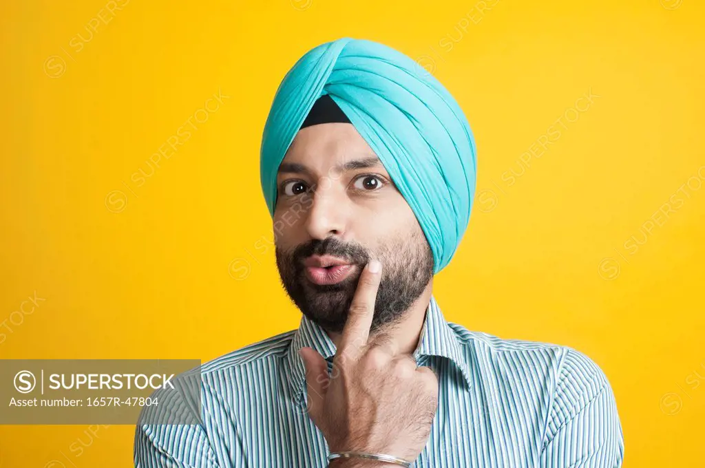 Portrait of a Sikh man gesturing