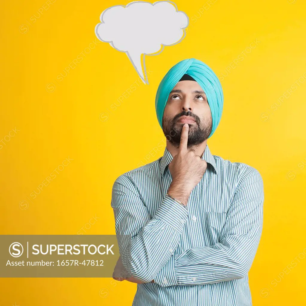 Close-up of a Sikh man thinking