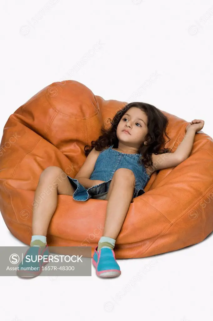 Girl relaxing on a bean bag