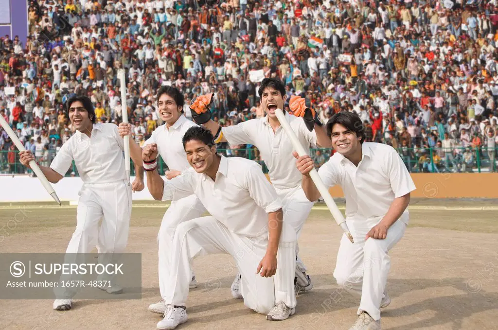 Cricket players celebrating their success