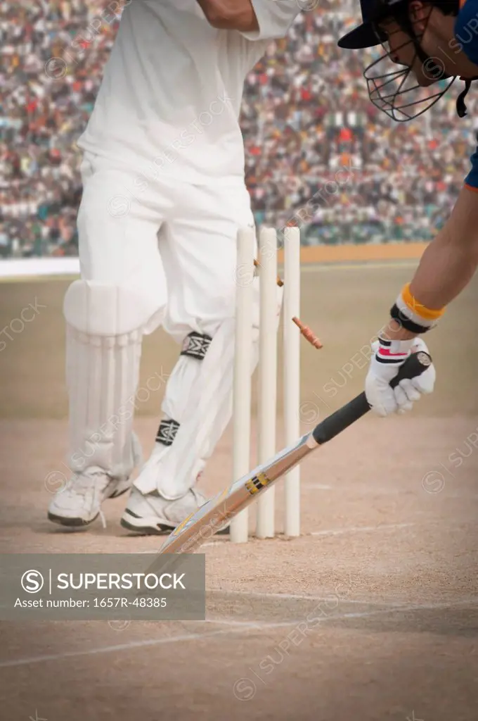 Cricket batsman scoring a run