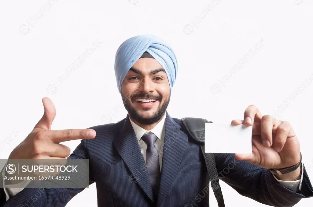 Businessman showing a blank business card