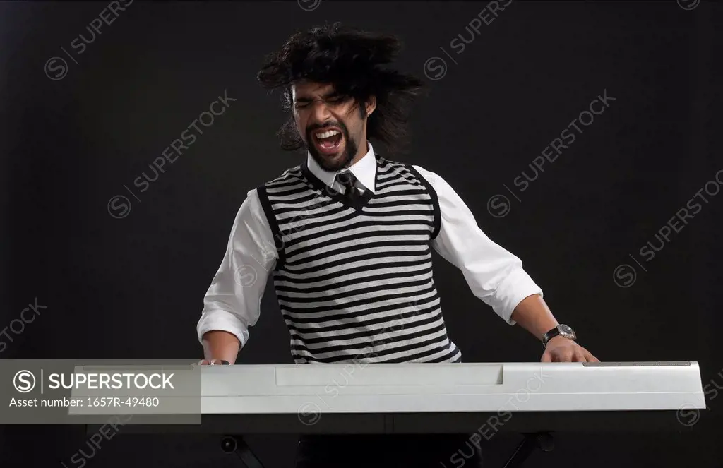 Musician playing an electric piano