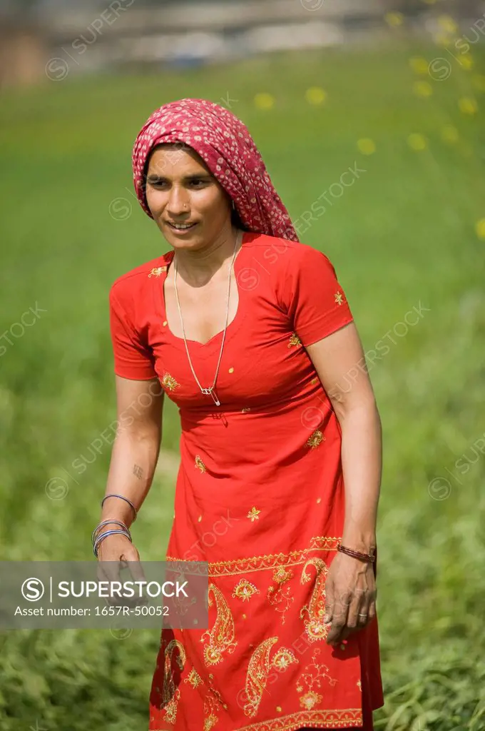 Woman working in a field, Farrukh Nagar, Gurgaon, Haryana, India