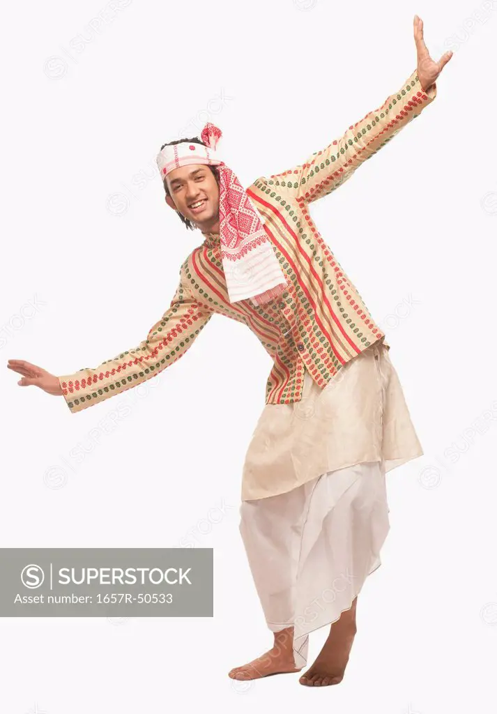 Portrait of a man dancing on Bihu festival
