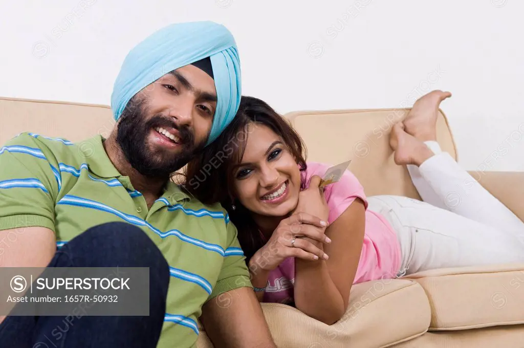 Sikh couple with a credit card