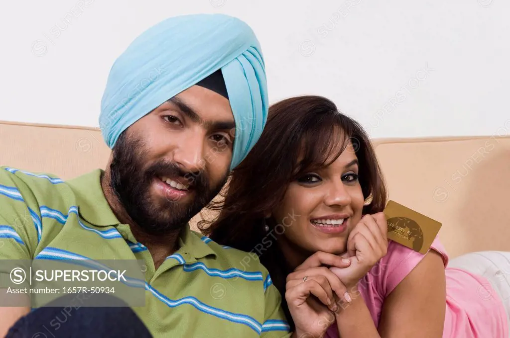 Sikh couple with a credit card
