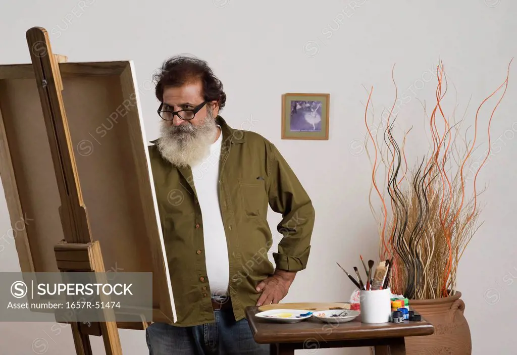 Man painting on a canvas