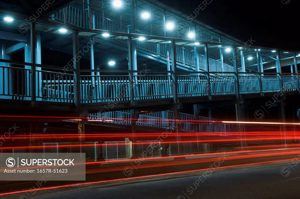 Footbridge lit up at night, National Highway 8, Gurgaon, Haryana, India