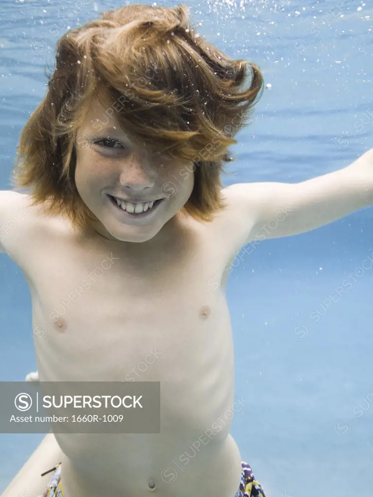 Portrait of a boy underwater