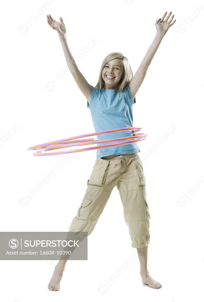 Portrait of a girl playing with a hula hoop