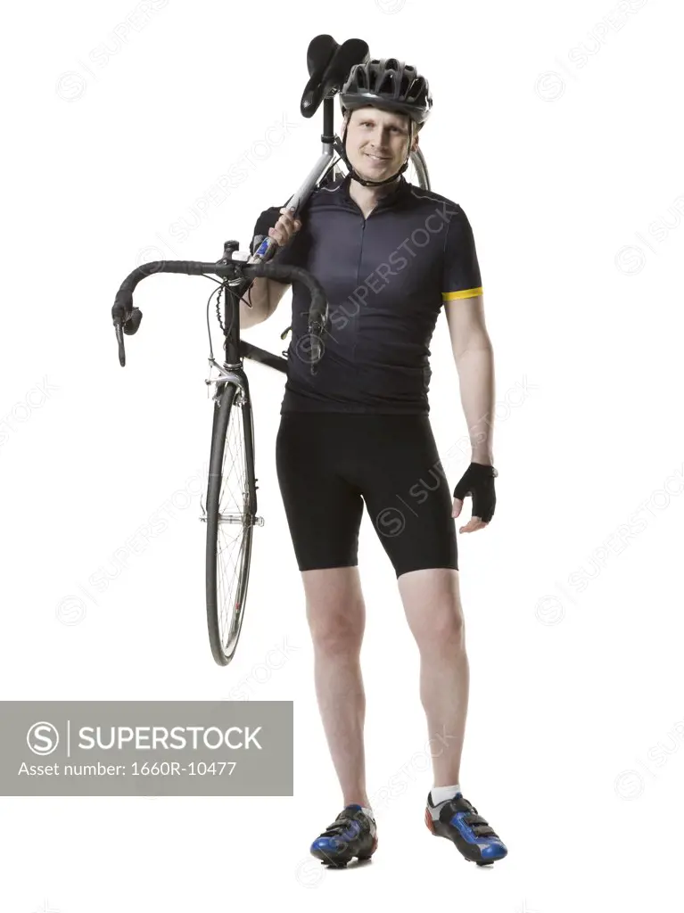 Portrait of a mature man carrying a cycle on his shoulder