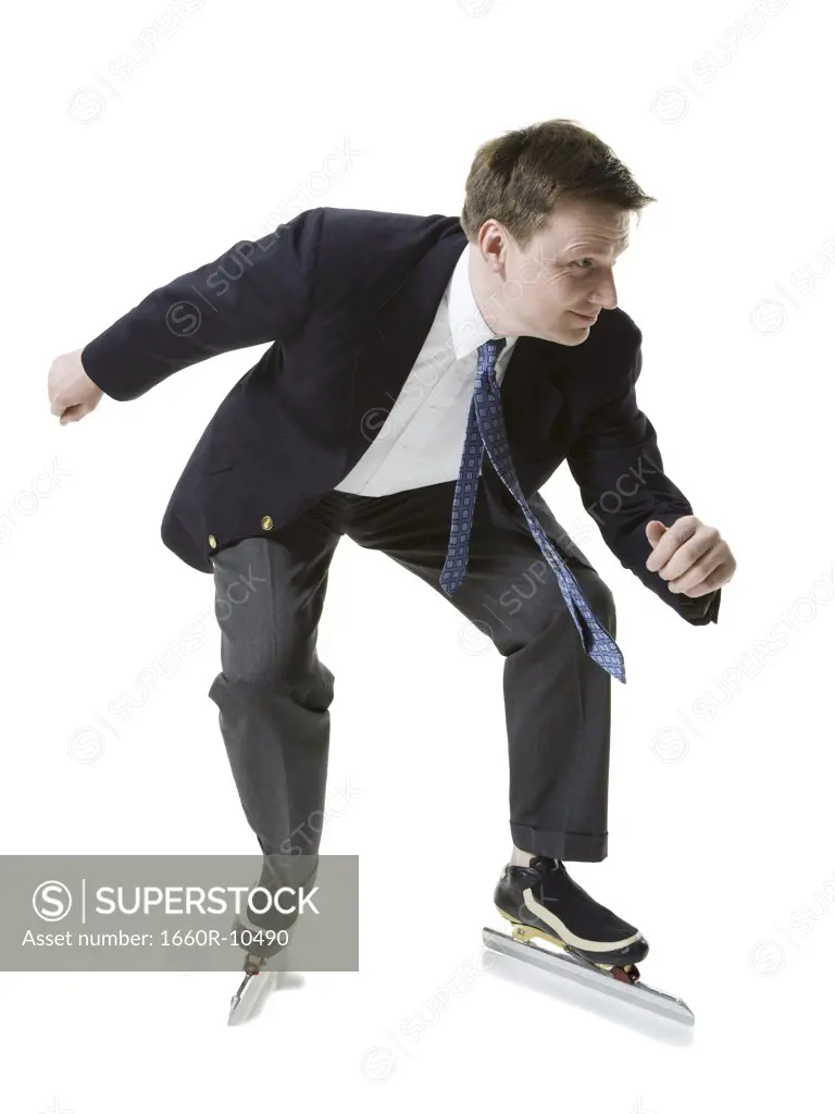 Businessman ice-skating