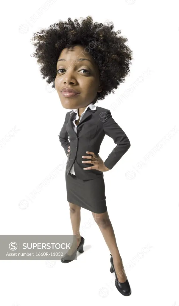 Portrait of a businesswoman standing with hands on hips