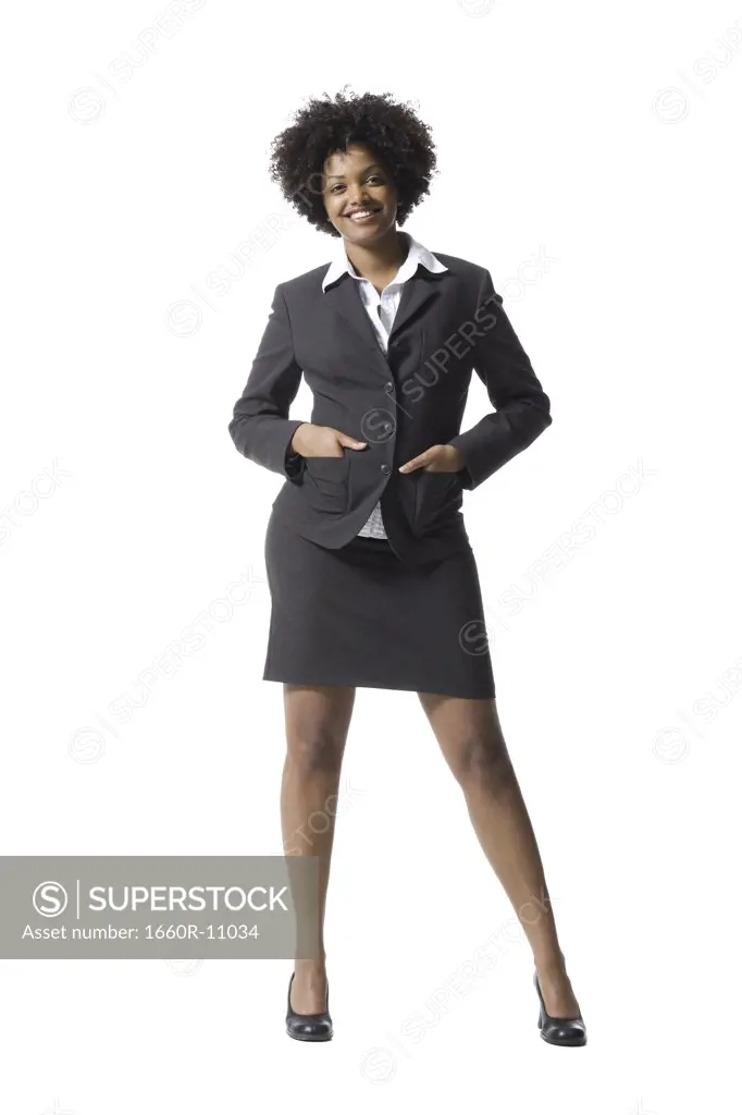 Portrait of a businesswoman standing with her hands in her pockets