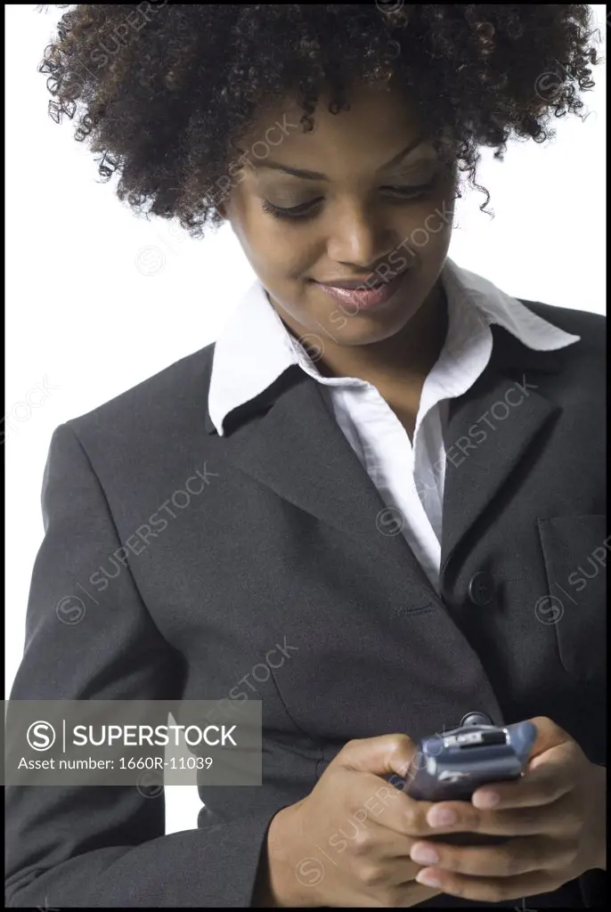 Close-up of a businesswoman holding a mobile phone