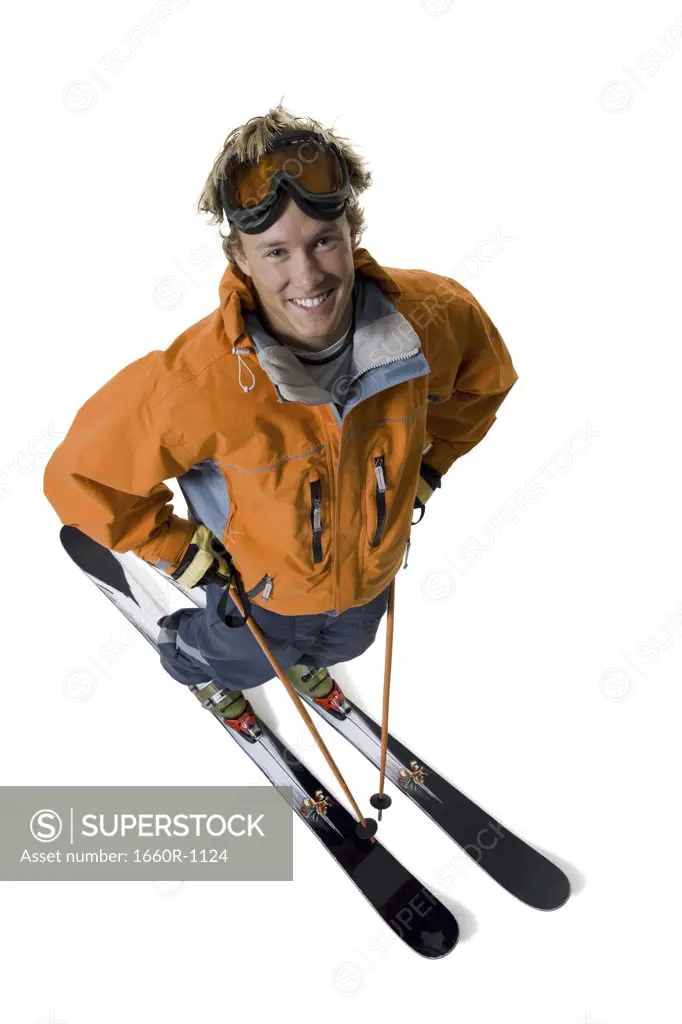 High angle view of a young man wearing skis